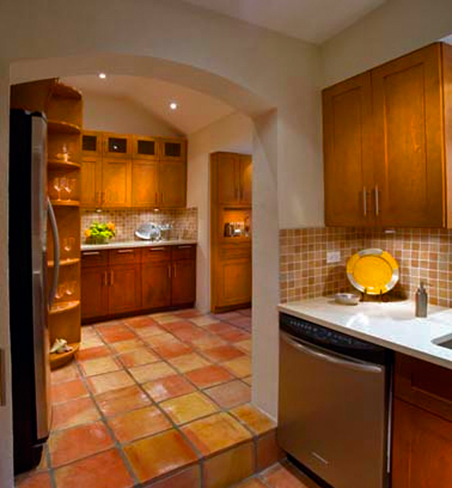 Complete renovation of kitchen required paint and finishes by 4Winds Studio to walls, ceiling as well as stain colour-matched to cabinetry and sealing of natural terra cotta tile.