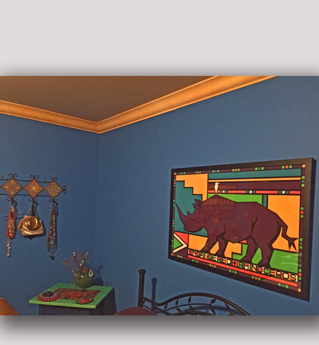 Colour matched walls and  faux limestone paint finish for moulding