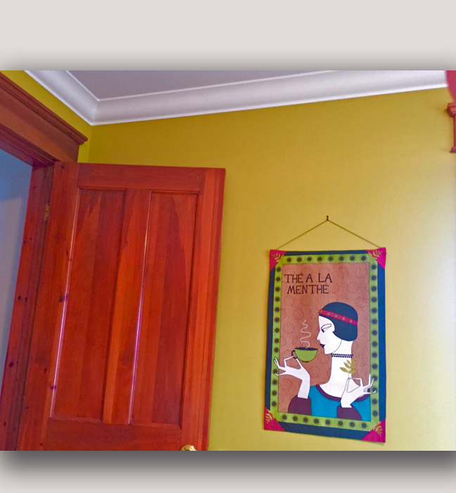 Chartreuse green colour-matched wall colour and cedar-coloured stains